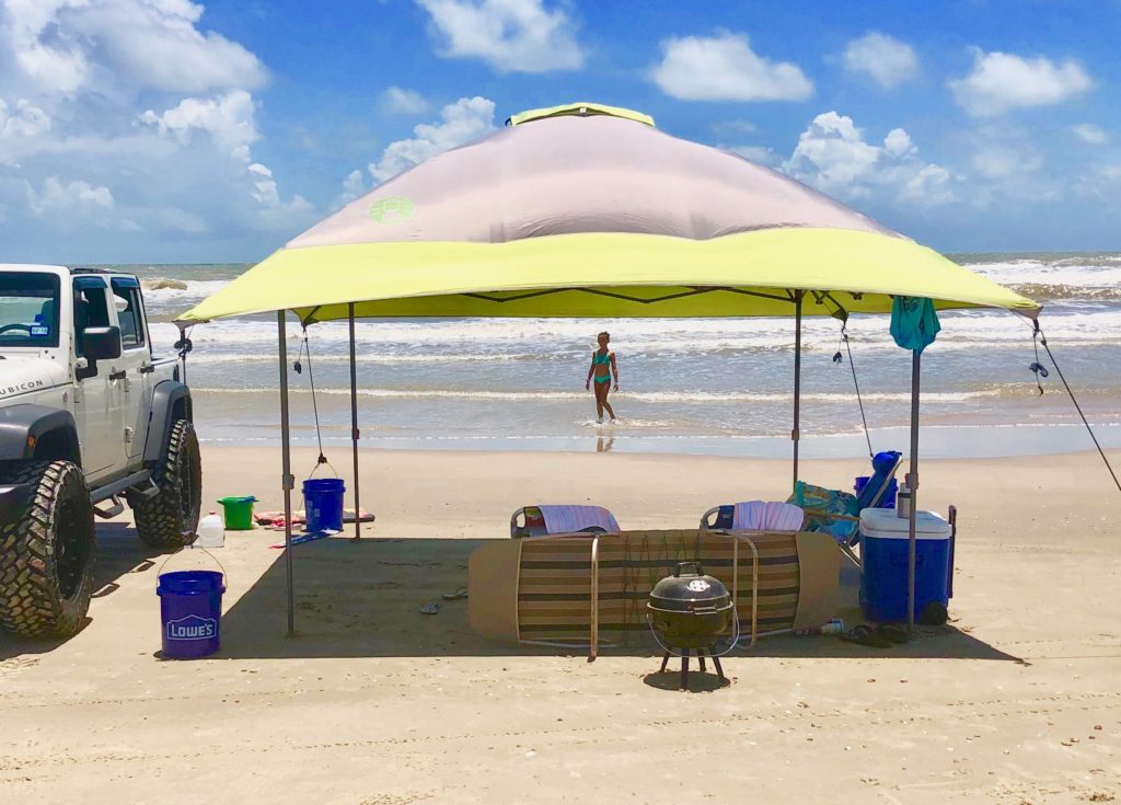Our beach set up with grill, cooler, tent, chairs and everything we need for a great beach day.